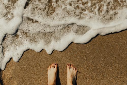 feet on a beach